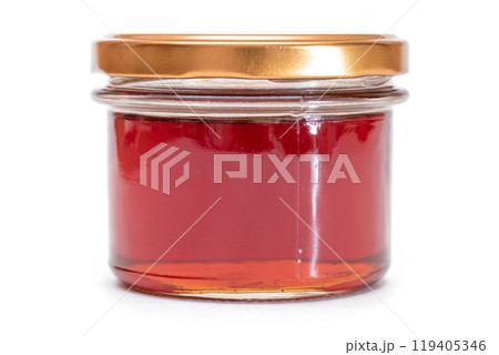 Dark Honey in a Small Glass Jar Isolated 119405346