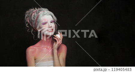 Charming beautiful woman in carnival Halloween costume, theater actress 119405483