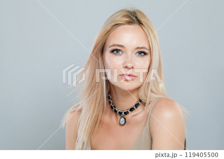Lovely blonde person portrait. Beauty woman with clear shiny fresh skin and blond hair  119405500