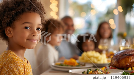 Smiling Family Enjoying Festive Dinner Together in a Bright Dining Room 119406932