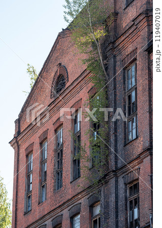 industrial background, wall of abandoned vintage factory building industrial background, wall of abandoned vintage factory building 119407019