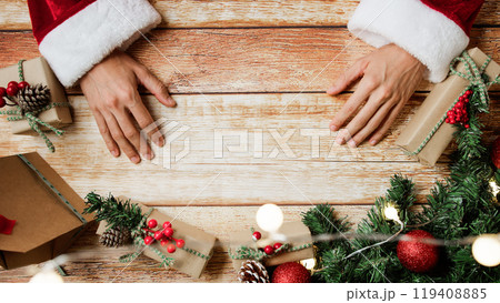 Christmas Background with Santa Claus Hands 119408885