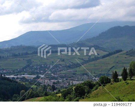 Village in the valley among the green mountains Village in the valley among the green mountains 119409177