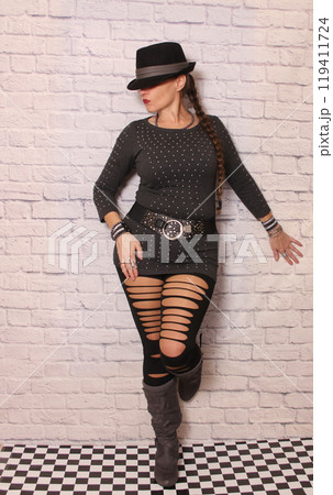 Woman Wearing Vintage 1980s Style Thrift Store Fashion Woman Wearing Vintage 1980s Style Thrift Store Fashion 119411724