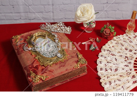 White Rose in Vase Next to Vintage Rhinestone Rose and Perfume Bottle White Rose in Vase Next to Vintage Rhinestone Rose and Perfume Bottle 119411779