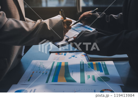 Team of business people are meeting to analyze data for marketing plan,Market research reports and income statistics, Financial and Accounting concept. 119413984