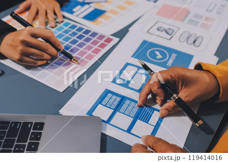 The designer team is designing the uxui system to make the uxui system work well on new phones and support system updates. Website development concept UI UX front end designer The designer team is designing the uxui system to make the uxui system work well on new phones and support system updates. Website development concept UI UX front end designer 119414016