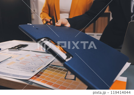 The designer team is designing the uxui system to make the uxui system work well on new phones and support system updates. Website development concept UI UX front end designer 119414044