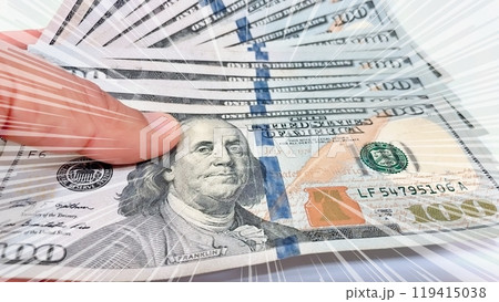 A Fan of $100 Bills.A close-up photo of a fan of $100 US dollar bills. The bills are arranged neatly, with the portrait of Benjamin Franklin visible on each bill.  119415038