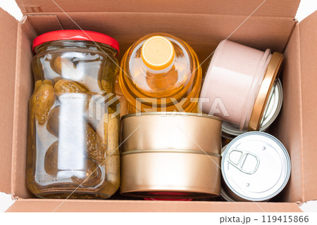 Carton Box with Canned Food, Cereals and Grocery - Donation Box or Food Reserves 119415866