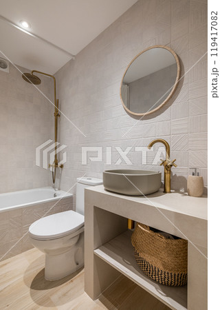 Explore Innovative Modern Bathroom Designs Featuring Luxurious Gold Fixtures and Natural Elements Explore Innovative Modern Bathroom Designs Featuring Luxurious Gold Fixtures and Natural Elements 119417082