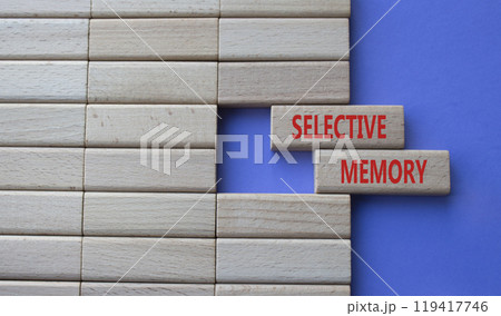 Selective Memory symbol. Concept word Selective Memory on wooden blocks. Beautiful purple background. Medicine and Selective Memory concept. Copy space 119417746