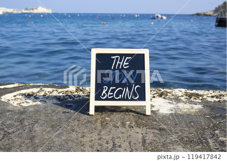 The Story Begins symbol. Blackboard with words The Story Begins. Beautiful sea background. Business and The Story Begins concept. Copy space. The Story Begins symbol. Blackboard with words The Story Begins. Beautiful sea background. Business and The Story Begins concept. Copy space. 119417842