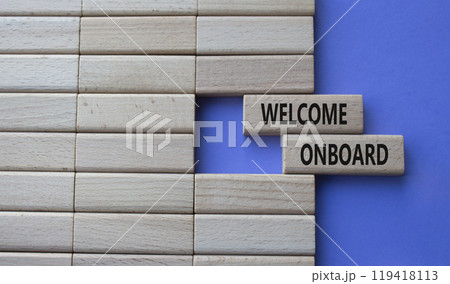 Welcome onboard symbol. Concept words Welcome onboard on wooden blocks. Beautiful purple background. Business and Welcome onboard concept. Copy space. Welcome onboard symbol. Concept words Welcome onboard on wooden blocks. Beautiful purple background. Business and Welcome onboard concept. Copy space. 119418113