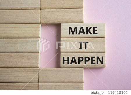 Make it Happen symbol. Concept words Make it Happen on wooden blocks. Beautiful pink background. Business and Make it Happen concept. Copy space. 119418192