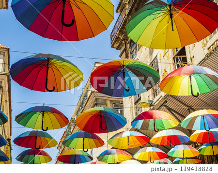 Pink street with colorful rainbow umbrellas, Lisbon, Portugal Pink street with colorful rainbow umbrellas, Lisbon, Portugal 119418828