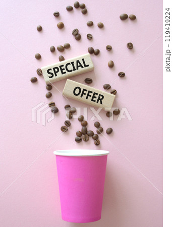 Special offer symbol. Concept word Special offer on wooden blocks. Beautiful pink background with coffee cup. Business and Special offer concept. Copy space 119419224