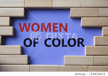 Women of color symbol. Concept words Women of color on wooden blocks. Beautiful purple background. Business and Women of color concept. Copy space. Women of color symbol. Concept words Women of color on wooden blocks. Beautiful purple background. Business and Women of color concept. Copy space. 119420015