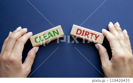 Clean or Dirty symbol. Concept word Clean or Dirty on wooden blocks. Man hand. Beautiful deep blue background. Gender and Clean or Dirty concept. Copy space Clean or Dirty symbol. Concept word Clean or Dirty on wooden blocks. Man hand. Beautiful deep blue background. Gender and Clean or Dirty concept. Copy space 119420435