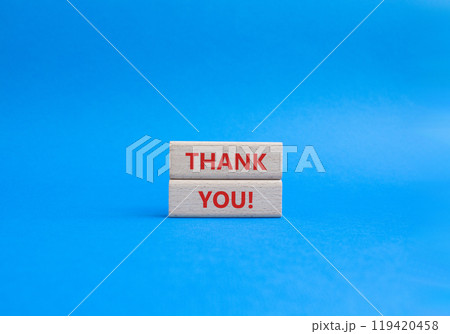Thank you symbol. Wooden blocks with words Thank you. Beautiful blue background. Business and Thank you concept. Copy space. Thank you symbol. Wooden blocks with words Thank you. Beautiful blue background. Business and Thank you concept. Copy space. 119420458