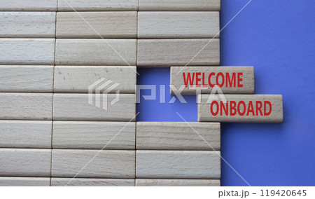 Welcome onboard symbol. Concept words Welcome onboard on wooden blocks. Beautiful purple background. Business and Welcome onboard concept. Copy space. Welcome onboard symbol. Concept words Welcome onboard on wooden blocks. Beautiful purple background. Business and Welcome onboard concept. Copy space. 119420645