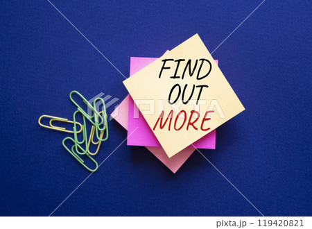 Find out more symbol. Steaky Notes Blackboard with words Find out more. Beautiful deep blue background. Business and Find out more concept. Copy space. 119420821