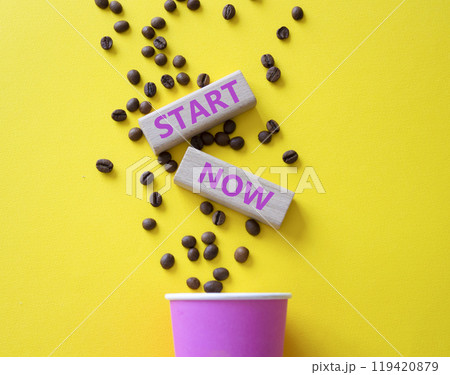 Start here symbol. Wooden blocks with words Start here Beautiful yellow background with coffee cup and coffee beans. Business and Start here concept. Copy space. Start here symbol. Wooden blocks with words Start here Beautiful yellow background with coffee cup and coffee beans. Business and Start here concept. Copy space. 119420879