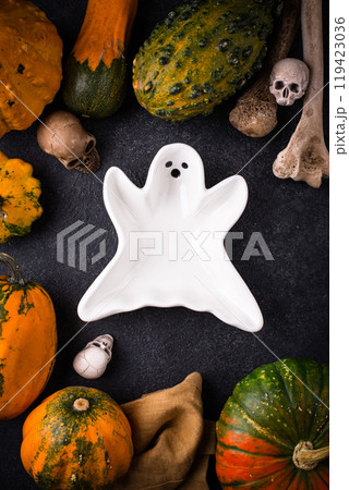 Halloween empty plate in shape of ghost 119423036