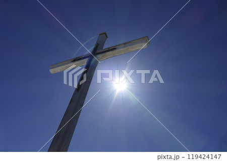 Summit cross of Rechelberg mountain in wintertime, Bavaria, Germany 119424147