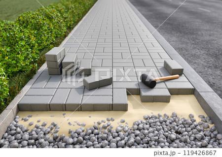 Rectangular concrete bricks on sidewalk 119426867