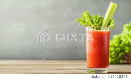 A vibrant Canadian Caesar cocktail with celery garnish, perfect for a refreshing drink on a summer day A vibrant Canadian Caesar cocktail with celery garnish, perfect for a refreshing drink on a summer day 119428348