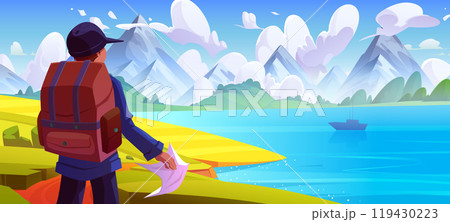 Male tourist with map looking at mountain lake 119430223