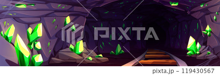 Mine cave with gemstones in walls and railroad. 119430567