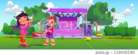 Children playing music at festival in summer park 119430599