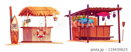 Beach tiki bar and standing surfboard. 119430625
