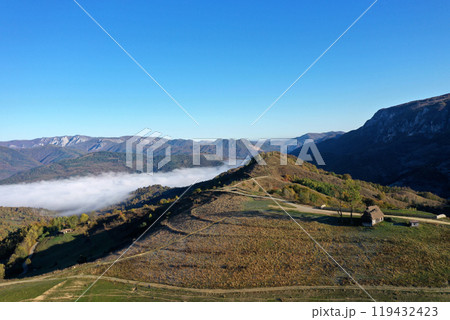 Aerial view of autumn morning mist and clouds in the valley Aerial view of autumn morning mist and clouds in the valley 119432423