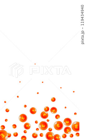 Vitamin E round capsules scattered randomly. 119434940