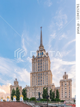 high-rise stalinist building near river at summer sunset in Moscow, Russia. Historic name is Hotel Ukraine. high-rise stalinist building near river at summer sunset in Moscow, Russia. Historic name is Hotel Ukraine. 119435761