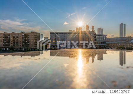 View of Berezhkovskaya Embankment in Moscow with reflection on a mirror stone surface 119435767