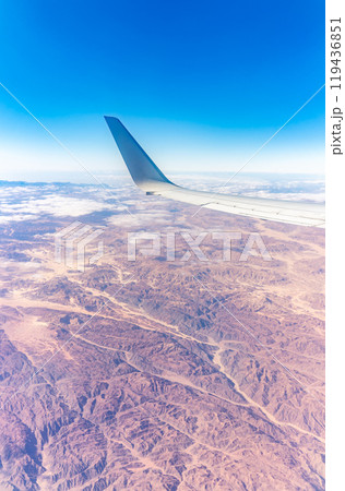 Aerial view on arabian desert and Red sea mountains from airplane 119436851