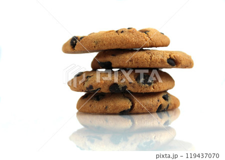 Chocolate Chip Cookies stacked on a white background with space for copyspace text. Chocolate Biscuit Isolate Chocolate Chip Cookies stacked on a white background with space for copyspace text. Chocolate Biscuit Isolate 119437070