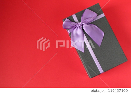 Gift Box Black on Green Black Blue Red Pink Background with Space for Copy Space Text 119437100
