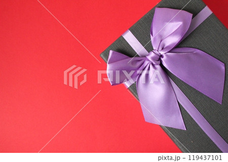 Gift Box Black on Green Black Blue Red Pink Background with Space for Copy Space Text Gift Box Black on Green Black Blue Red Pink Background with Space for Copy Space Text 119437101