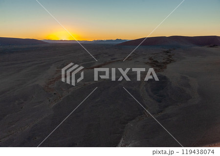 Climbing Dune 45 at sunrise Climbing Dune 45 at sunrise 119438074