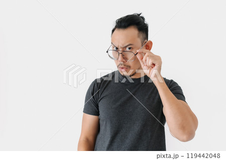 Serious angry face freelance man bun hair in black on white. 119442048