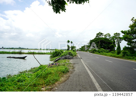 Scenic beauty of Wetland beside road at Kharibari Kolkata Scenic beauty of Wetland beside road at Kharibari Kolkata 119442857