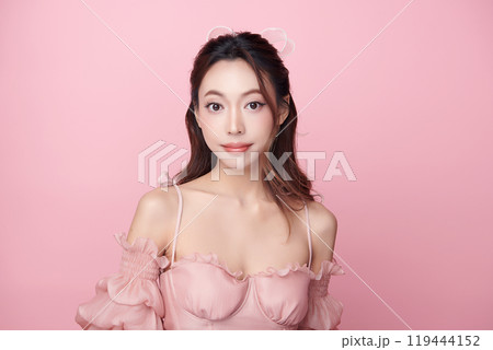 Beautiful young asian woman with clean fresh skin on pink background, Face care, Facial treatment, Cosmetology, beauty and spa, Asian women portrait. Beautiful young asian woman with clean fresh skin on pink background, Face care, Facial treatment, Cosmetology, beauty and spa, Asian women portrait. 119444152