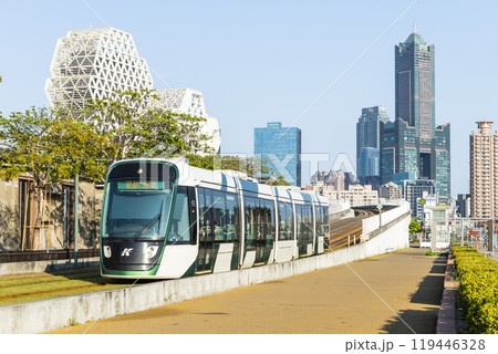 The circular light rail train drives past Pier-2 Art Center in Kaohsiung, Taiwan. The circular light rail train drives past Pier-2 Art Center in Kaohsiung, Taiwan. 119446328