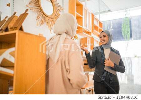 Professional Women Engaging in Meaningful Conversation at a Modern Workspace 119446810