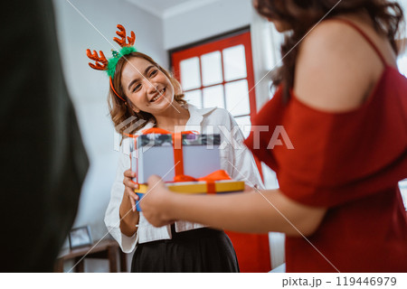 A Joyful Holiday Celebration filled with Wonderful Gifts and Cheerful Friends A Joyful Holiday Celebration filled with Wonderful Gifts and Cheerful Friends 119446979